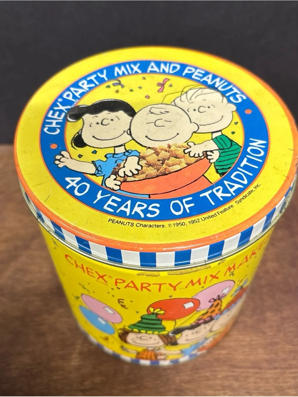 Peanuts Yellow Party Mix Tin with Multicolor Cartoon Characters